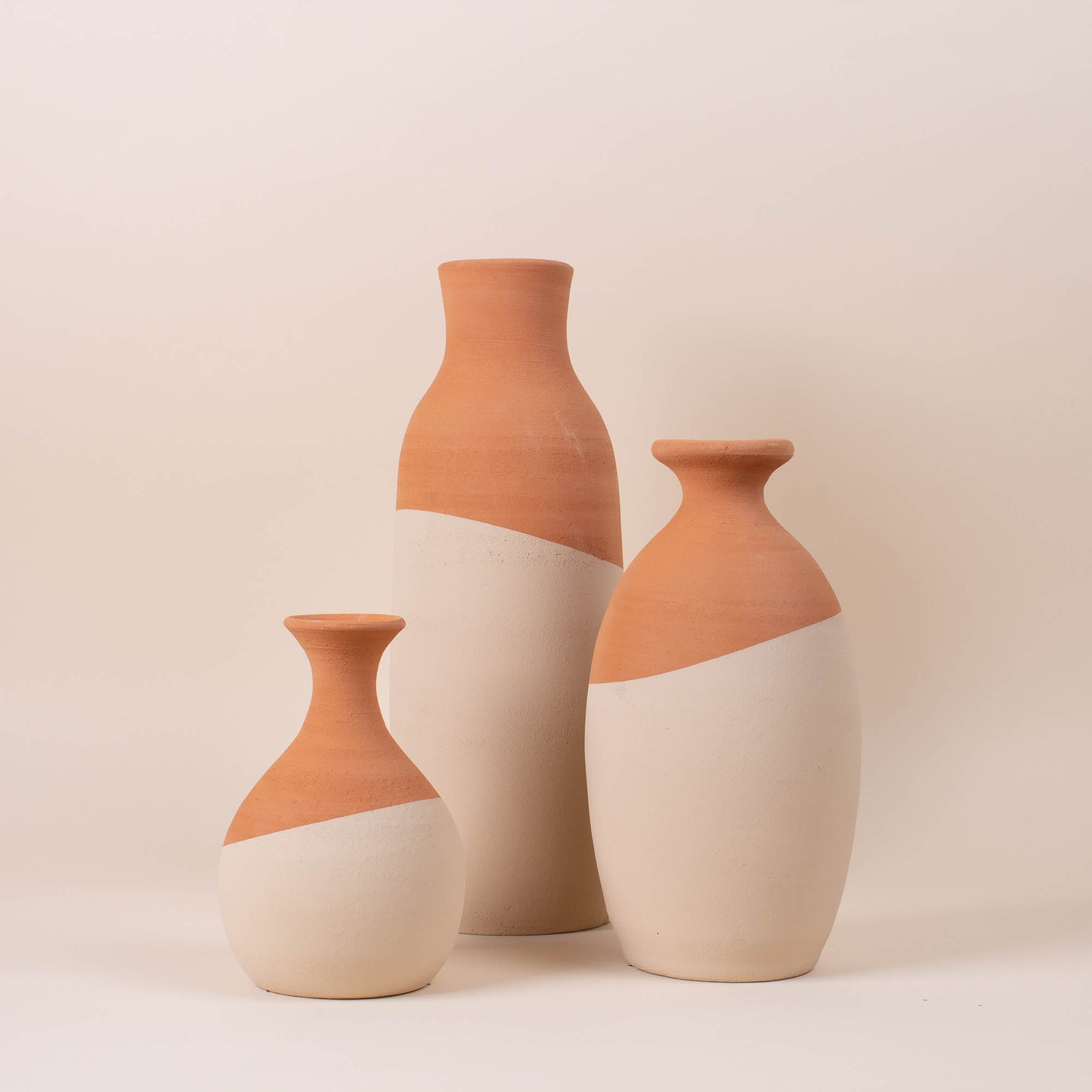 
                  
                    Small Ivory Dipped Vase
                  
                