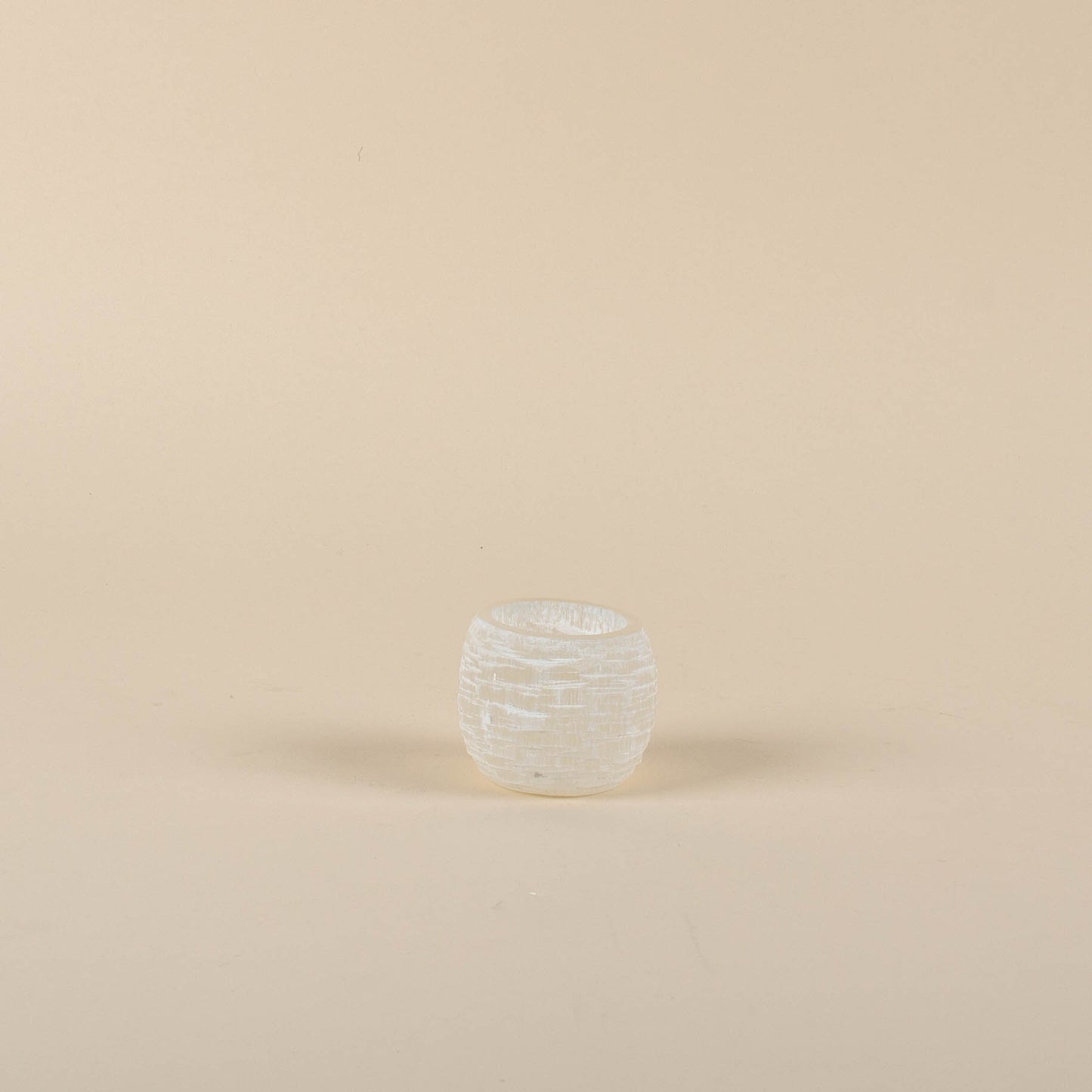 
                  
                    Glacier Selenite Sphere Candle Holder - Small
                  
                